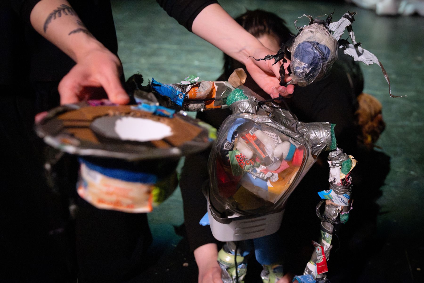 Close-up of a puppet made of found objects
